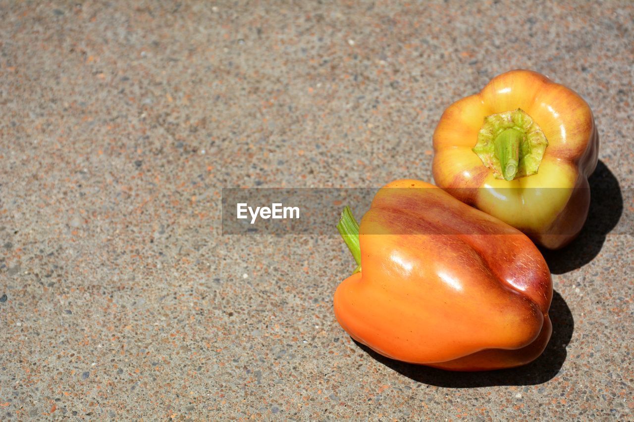 High angle view of orange bell peppers