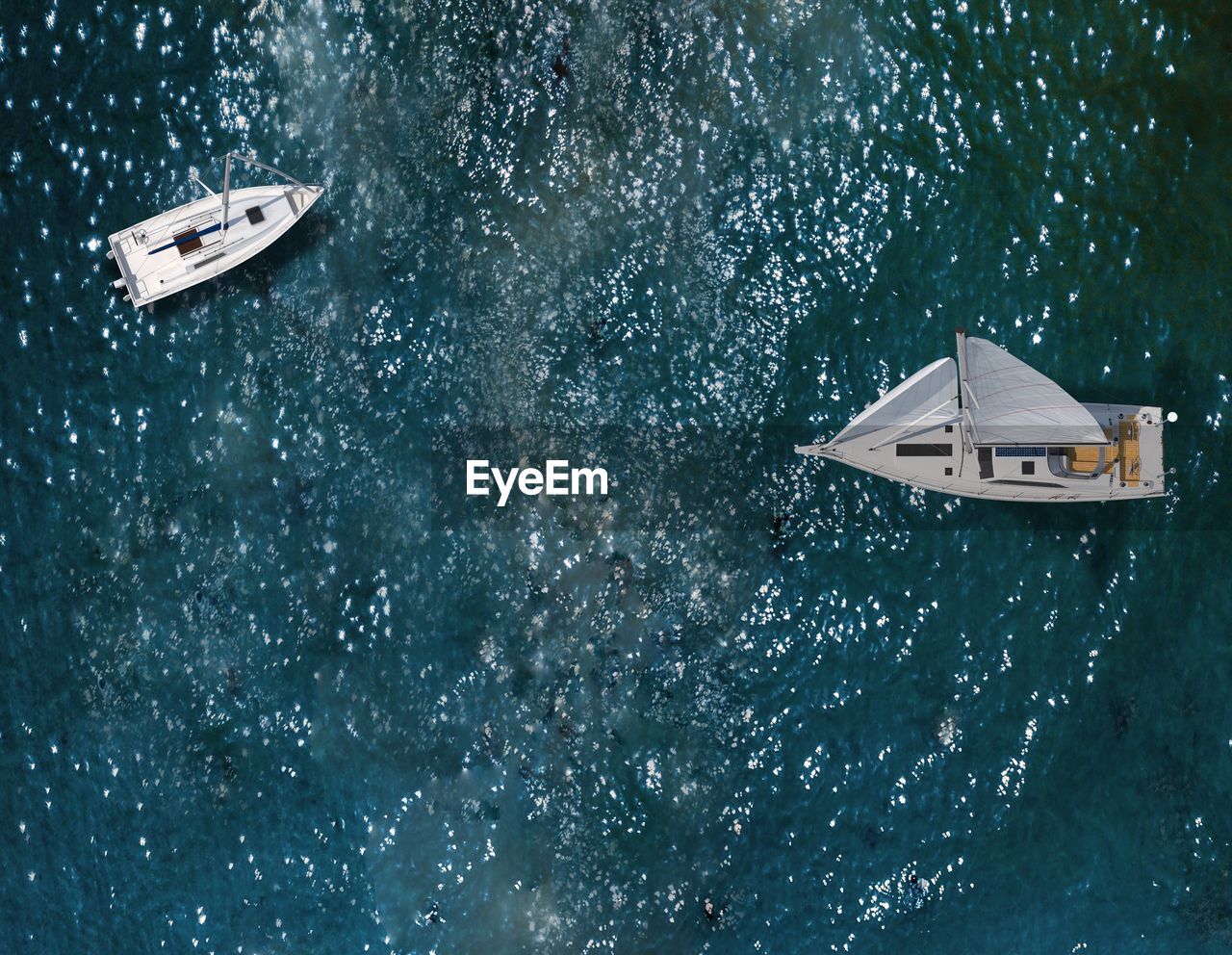 Aerial view of sailboat on sea