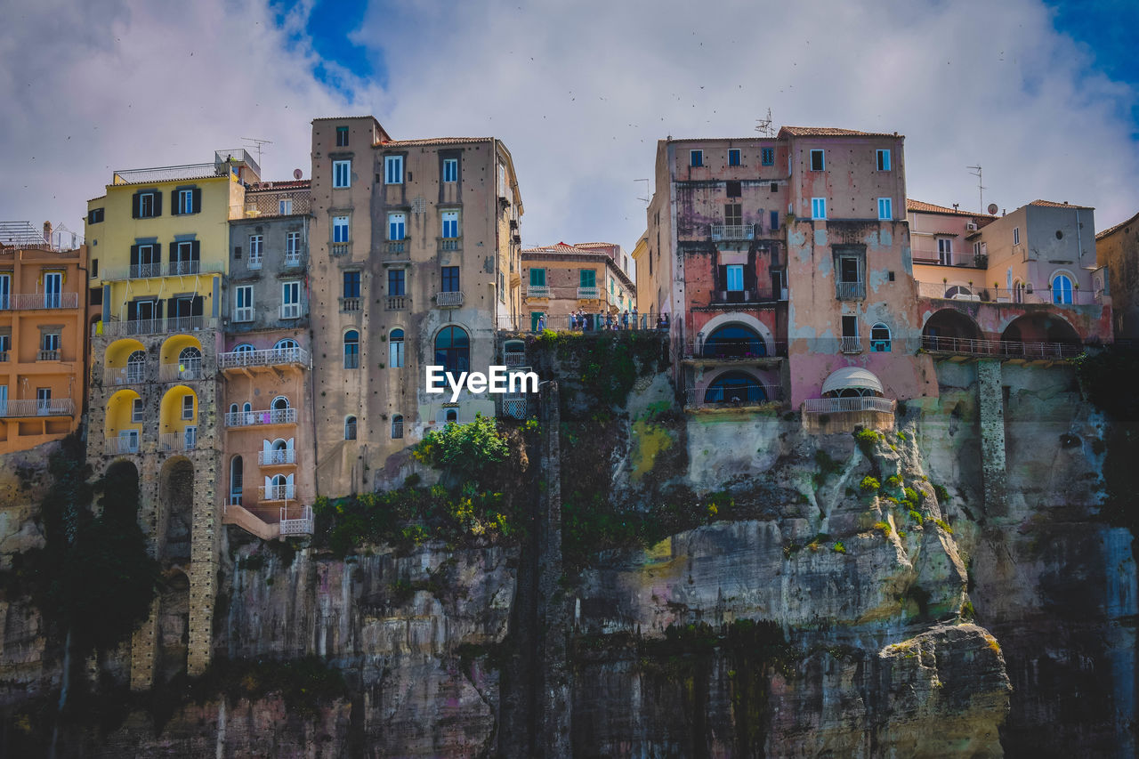 Buildings in city against sky