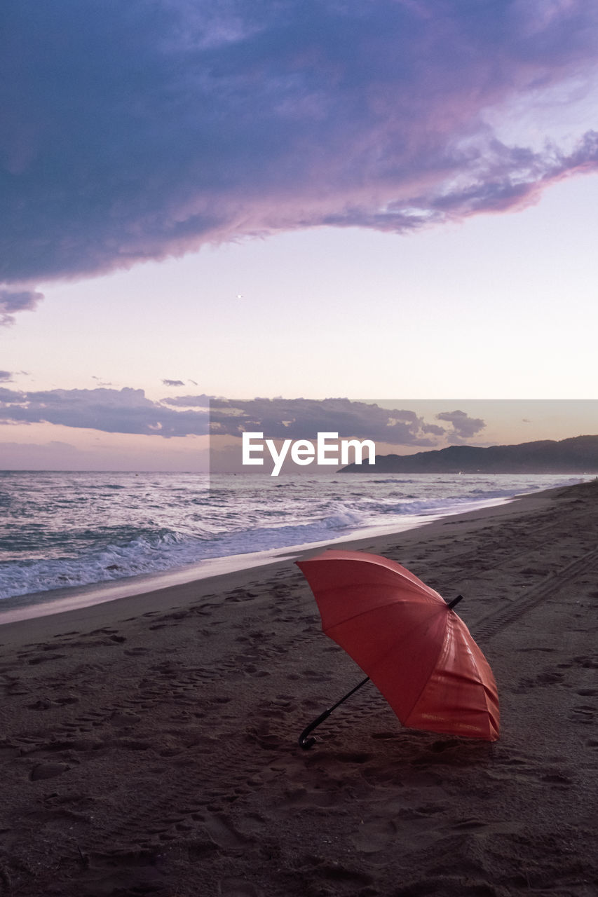 scenic view of sea against sky at sunset