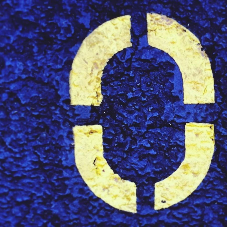 CLOSE-UP OF YELLOW OBJECT