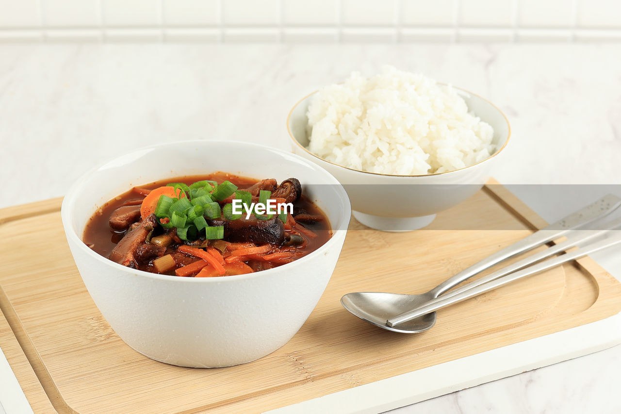 Kimchi stew or kimchi soup, korea's national dish spicy soup with vegetable, meat, eggs, tofu