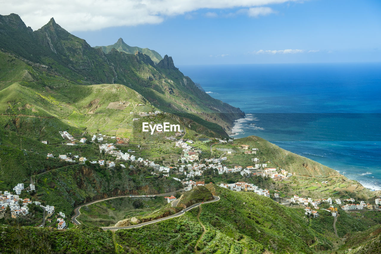 High angle view of sea shore against sky