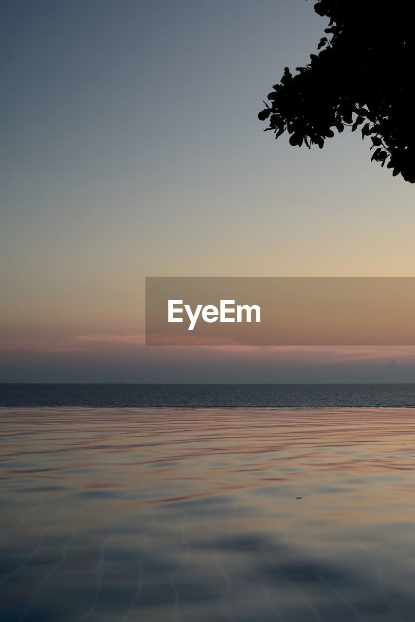 Infinity pool at sunset. sai daeng. koh tao. thailand