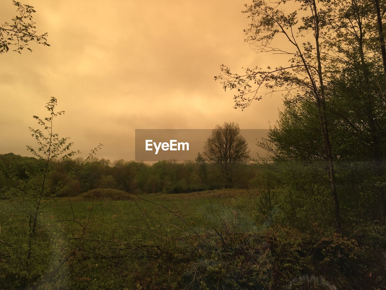 SCENIC VIEW OF LAND AGAINST SKY DURING SUNSET