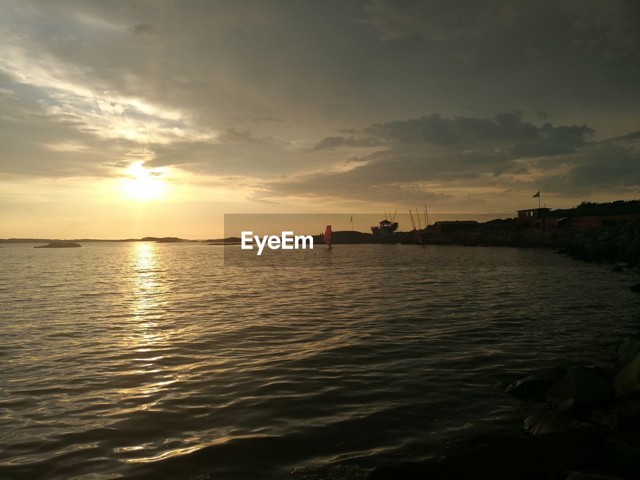 SCENIC VIEW OF SEA DURING SUNSET