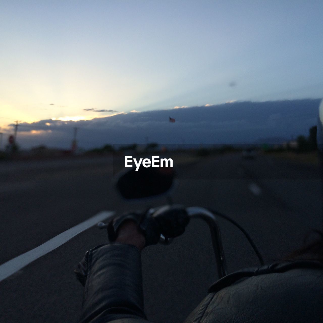 CROPPED IMAGE OF PERSON AGAINST SKY AT SUNSET