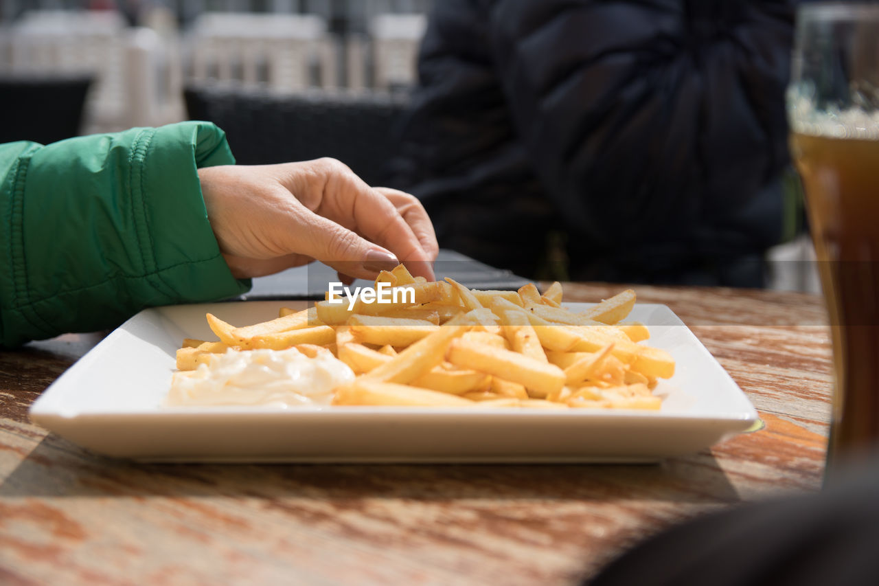 Close-up of person eating food