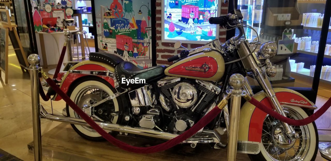 CLOSE-UP OF BICYCLE PARKED ON METAL