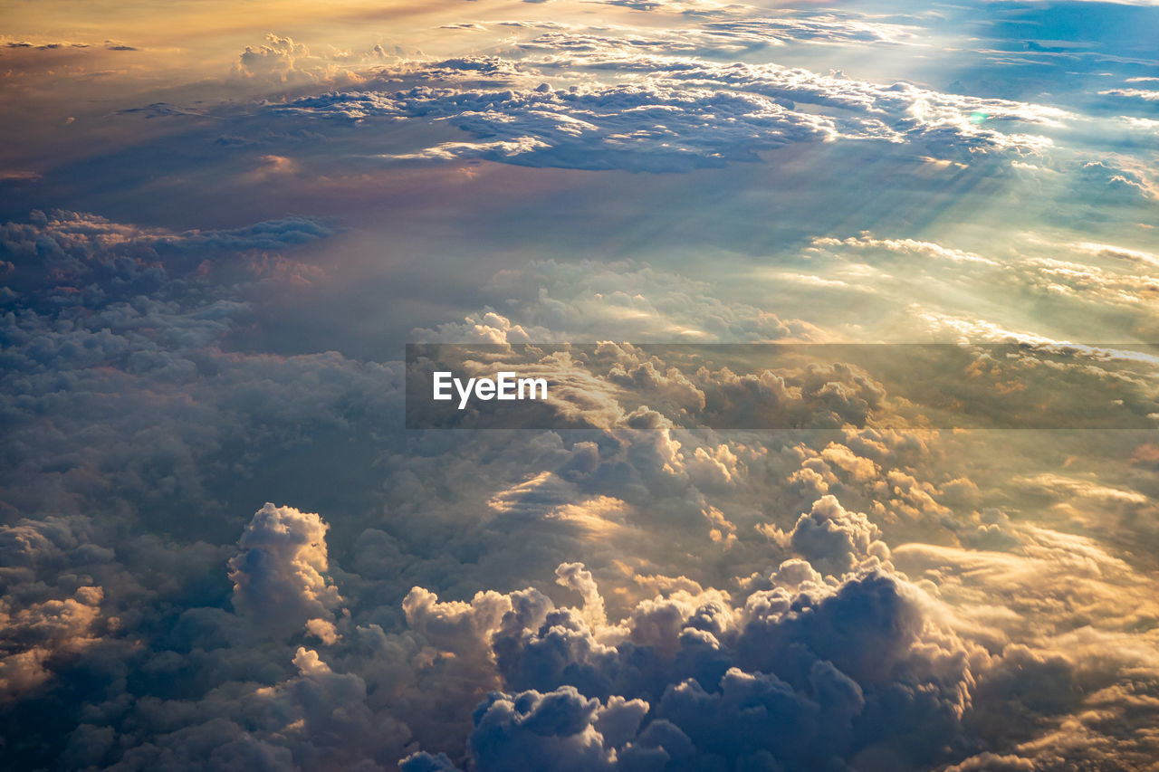 Stunning rainbow-coloured cloudscape as we fly over the balkans