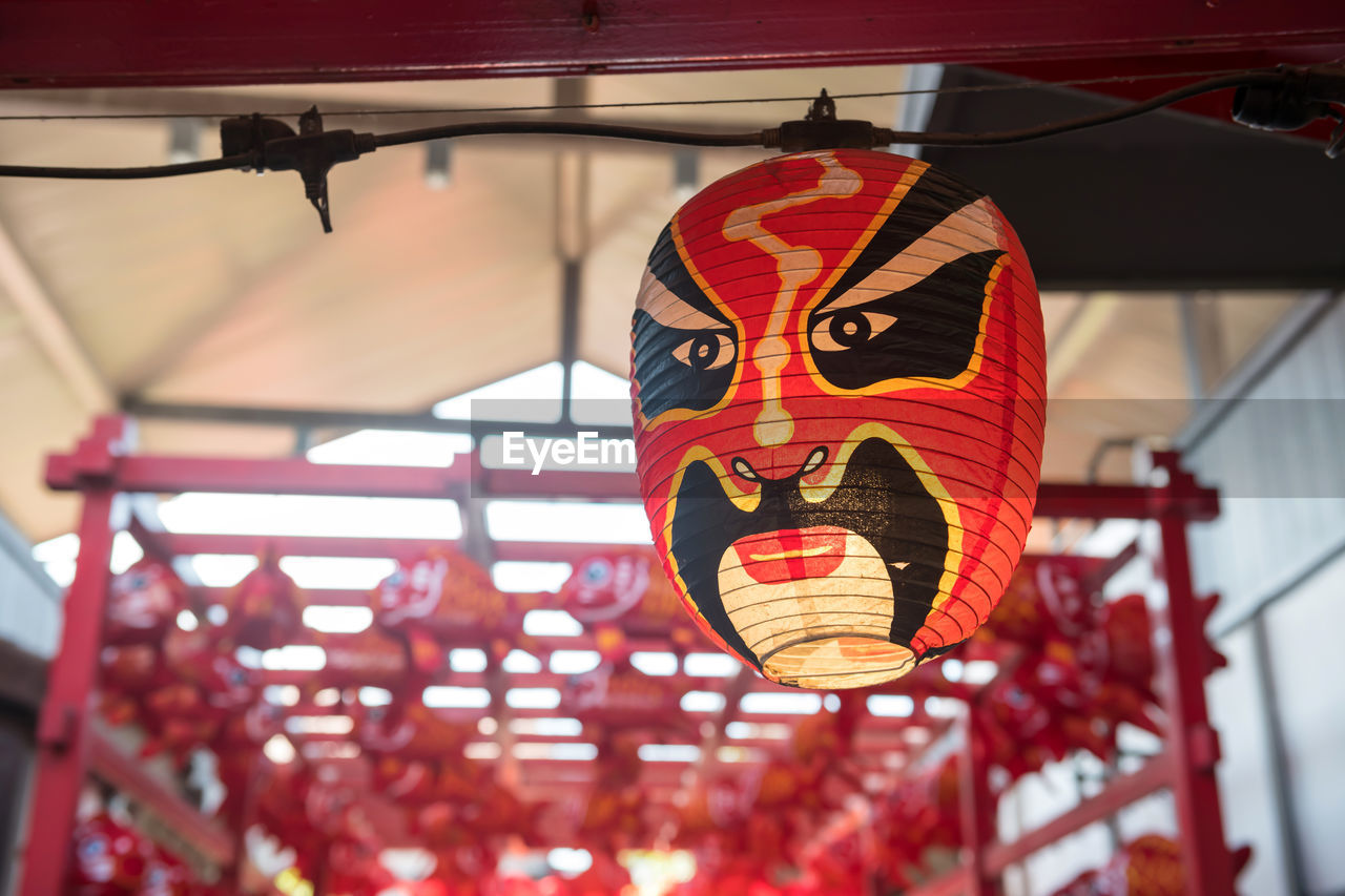 red, lantern, hanging, chinese new year, festival, celebration, tradition, chinese lantern, lighting equipment, event, chinese lantern festival, no people, decoration, focus on foreground, architecture, low angle view, holiday, outdoors