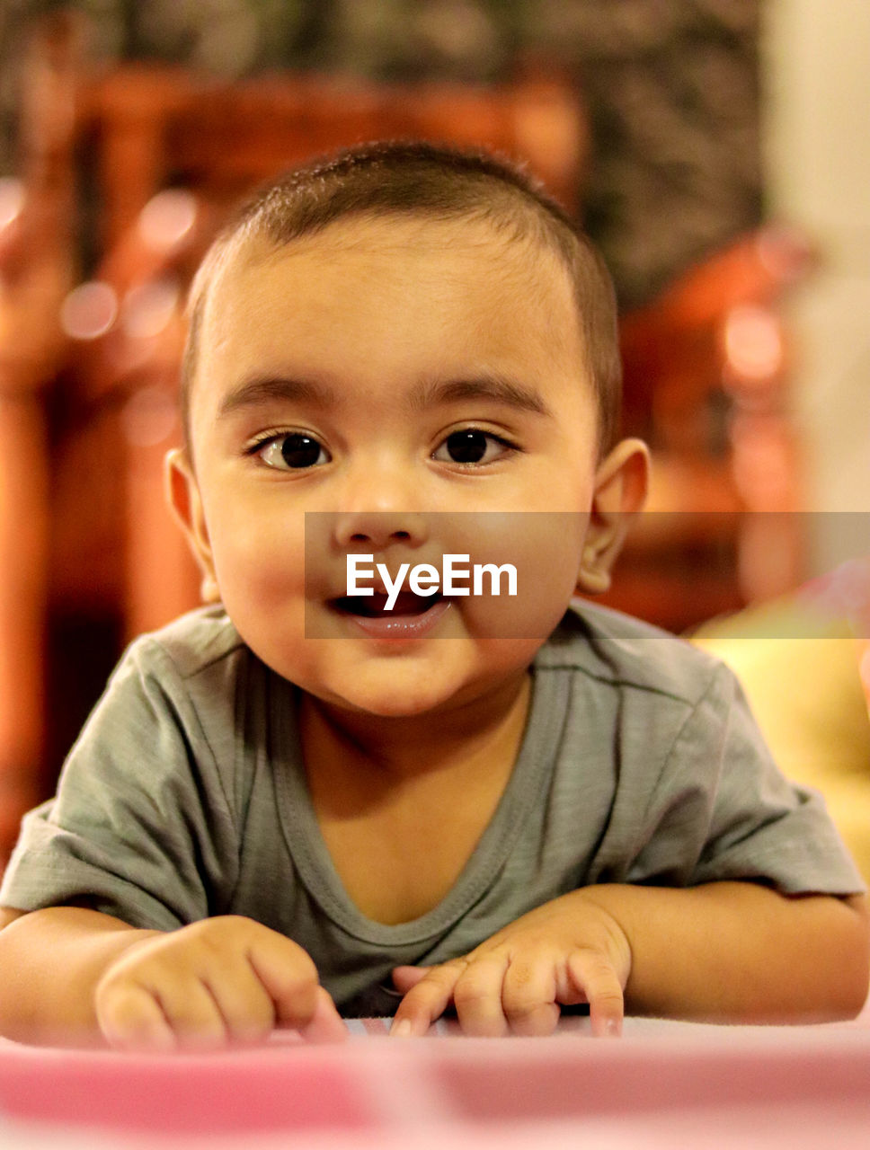 PORTRAIT OF CUTE BOY LOOKING AT CAMERA