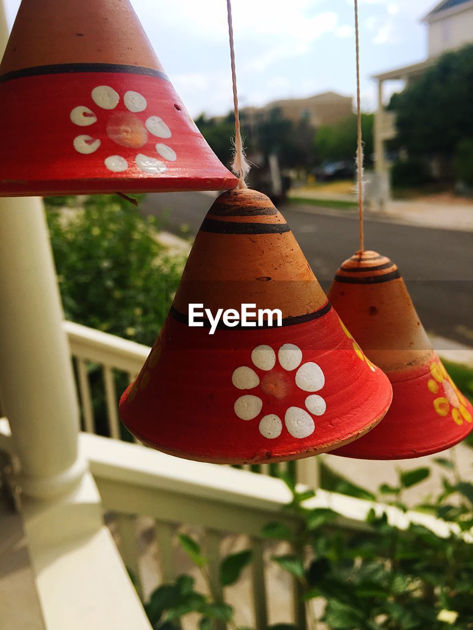 Close-up of lanterns hanging at porch