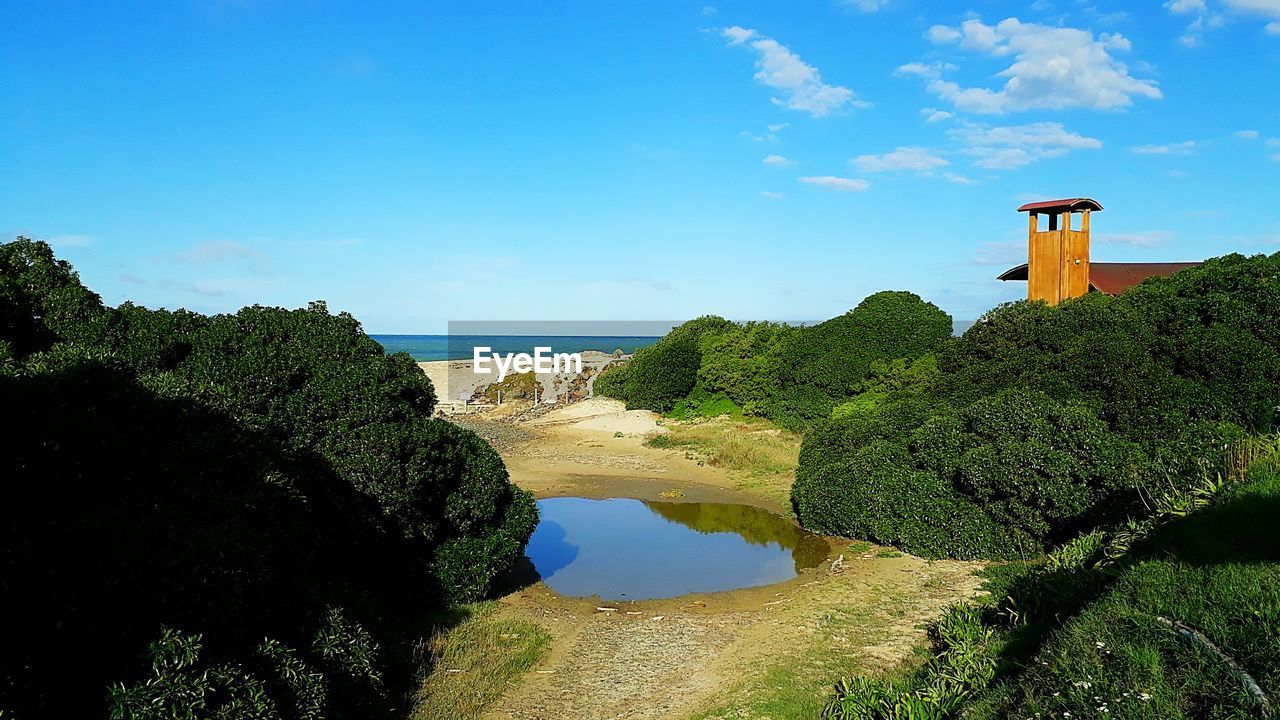 SCENIC VIEW OF SEA AGAINST BLUE SKY