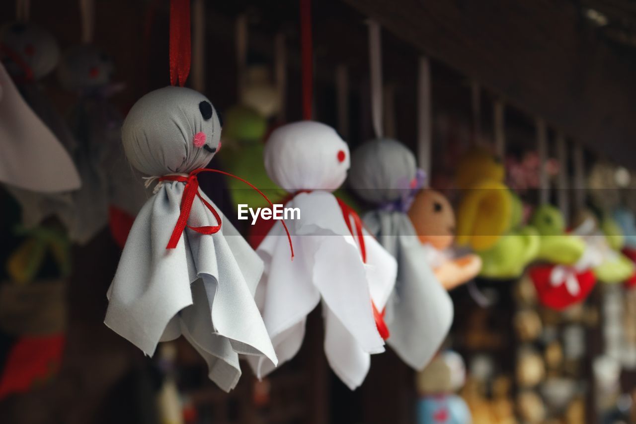 Close-up of stuffed toy hanging