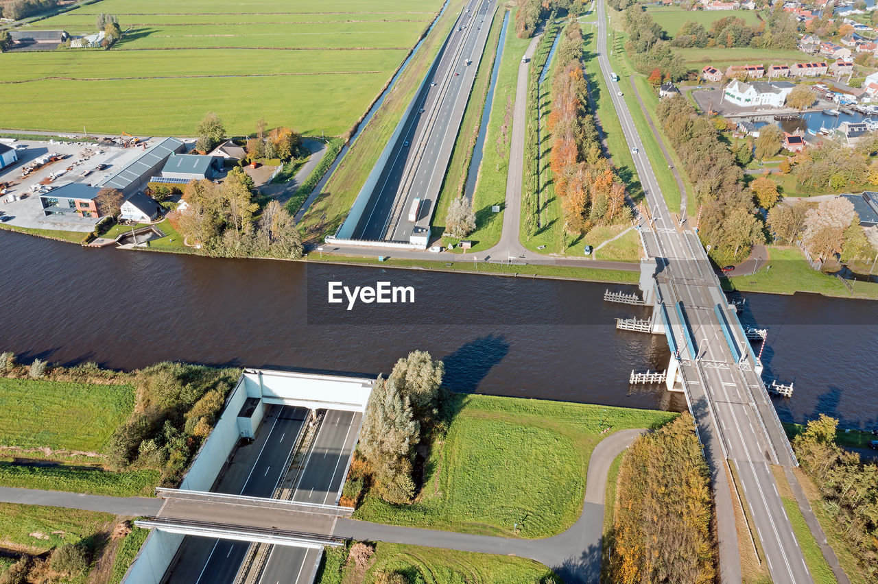Aerial from the princes margriet aquaduct at the highway a7 near uitwellingerga in the netherlands