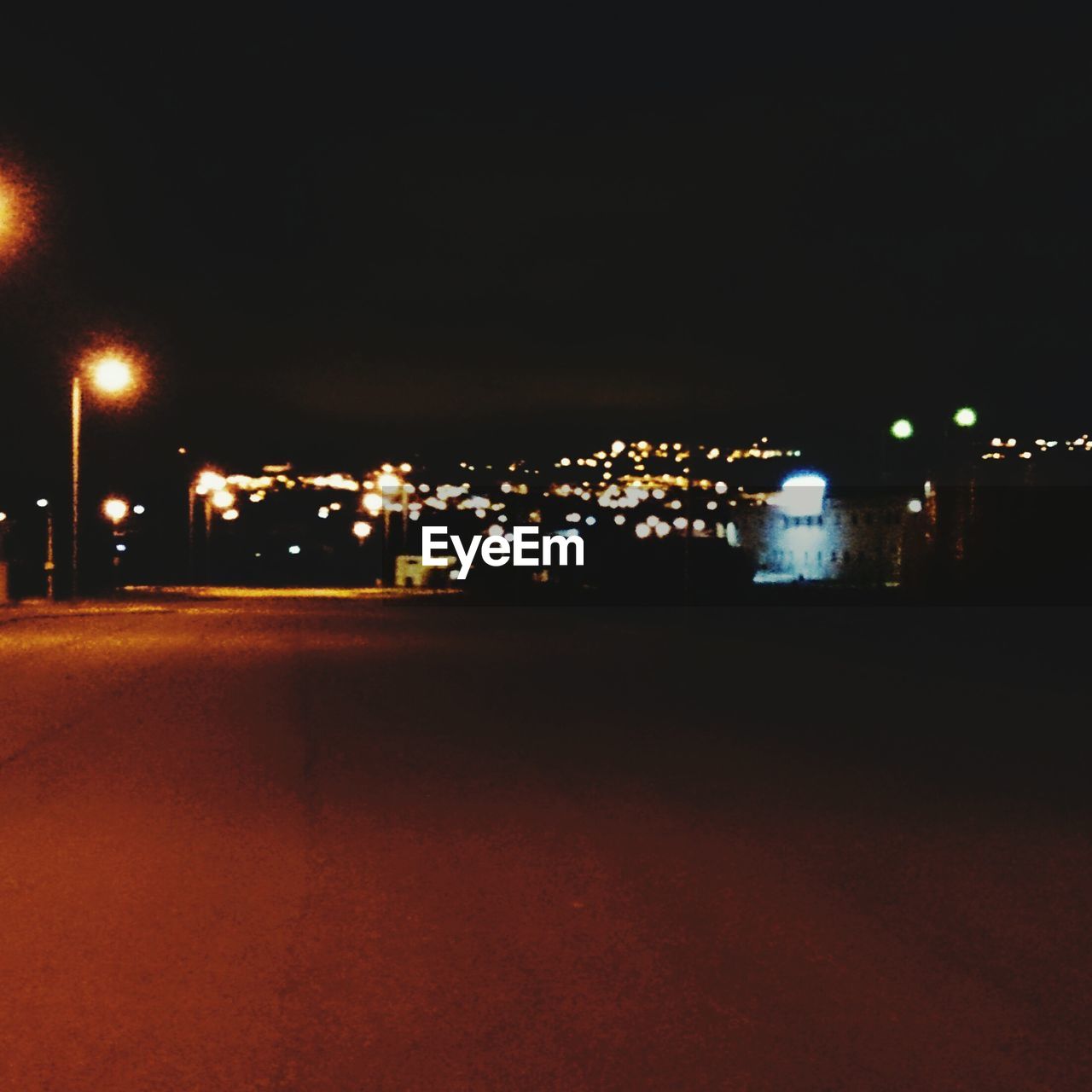 VIEW OF ILLUMINATED STREET LIGHT AT NIGHT