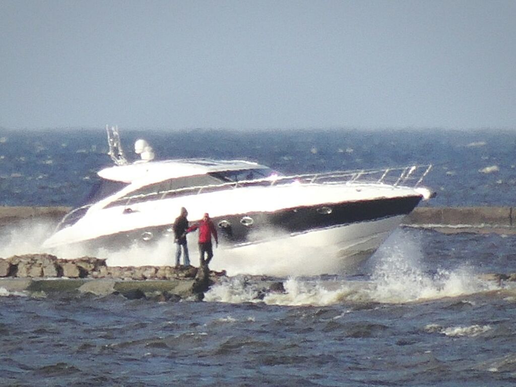 TOURISTS IN WATER