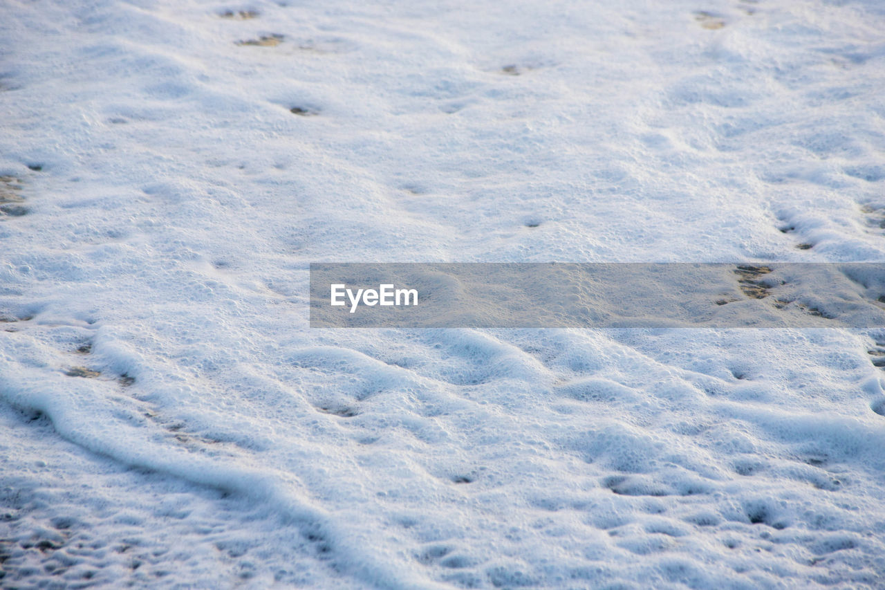 Full frame shot of snow covered land