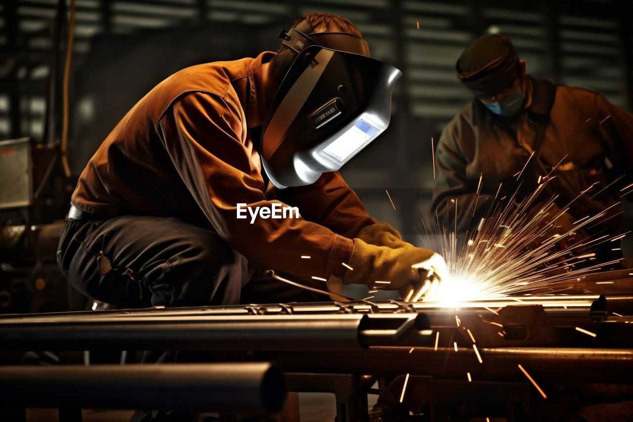 rear view of man working at workshop