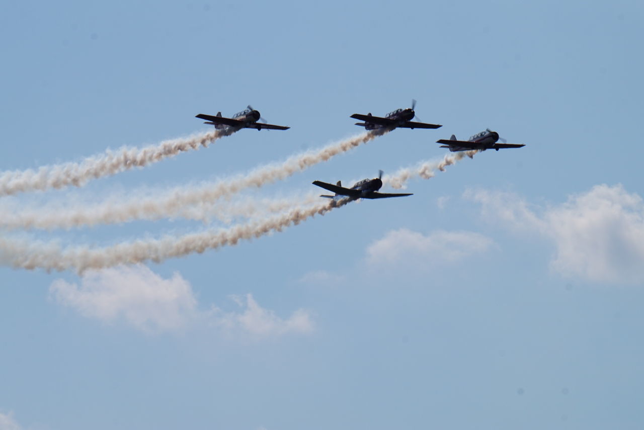 LOW ANGLE VIEW OF AIRSHOW IN SKY