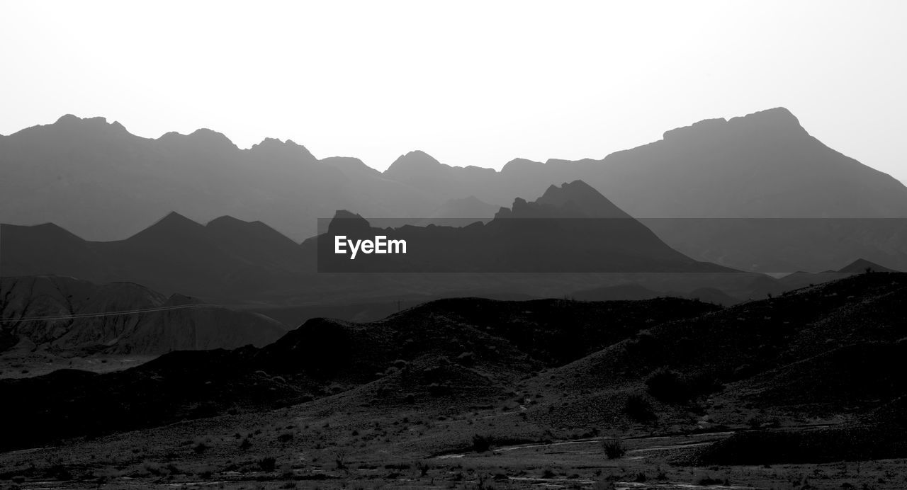 Scenic view of mountains against clear sky