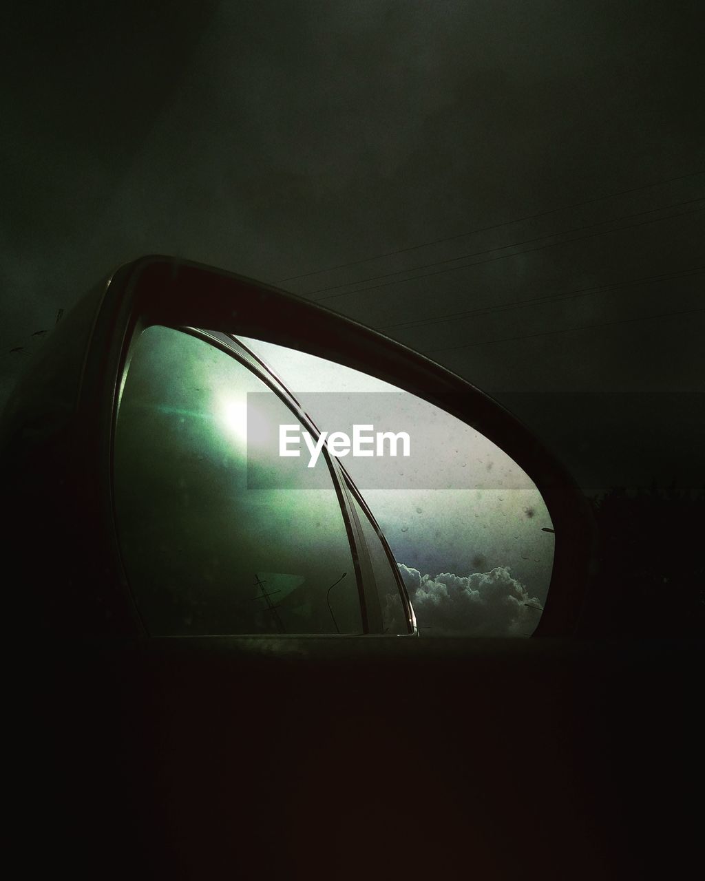 CLOSE-UP OF CAR WINDOW