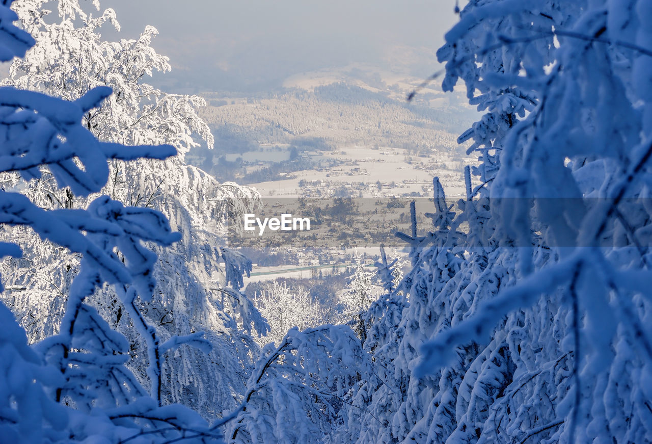 SNOW COVERED LAND AND MOUNTAINS