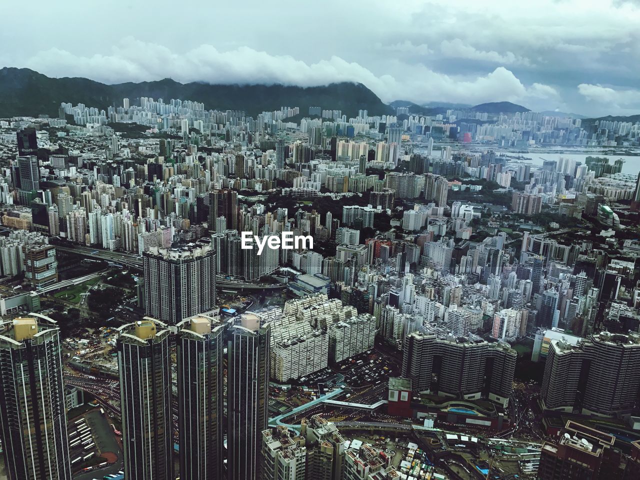 High angle view of buildings in city against sky