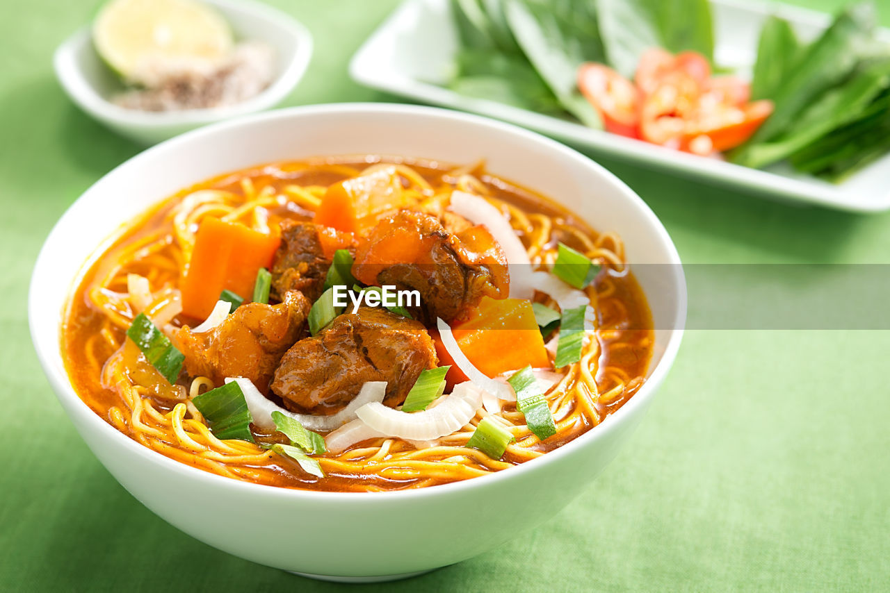 Close-up of soup in bowl on table