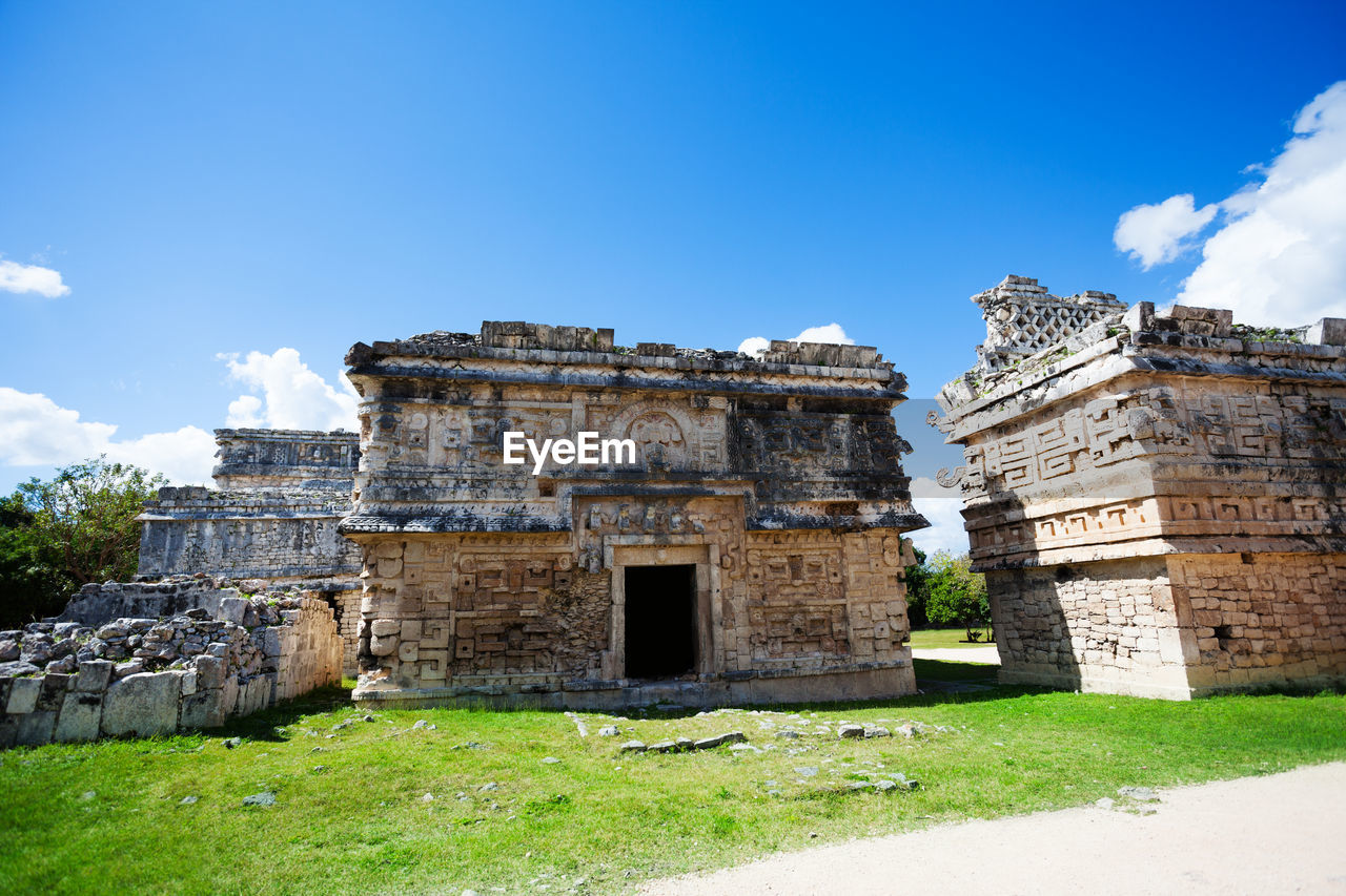 OLD RUINS OF BUILDING AGAINST BLUE SKY