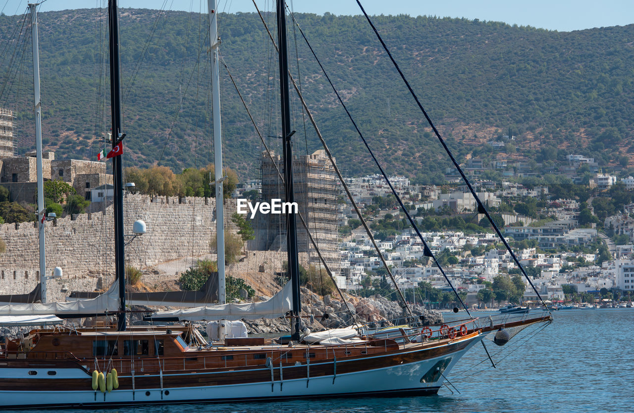 Boats and yachts in the harbor of bodrum in the land of turkey