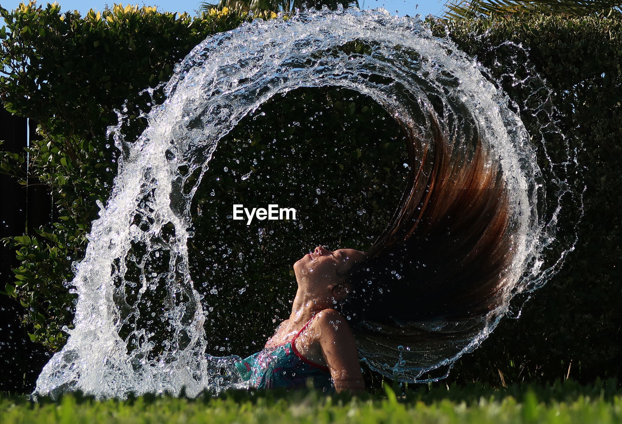 Full frame shot of water splashing on grass