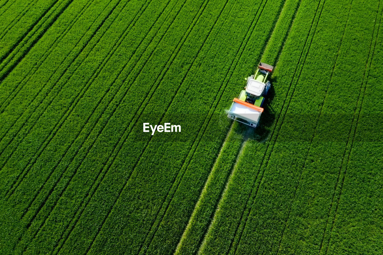 High angle view of tractor on agricultural field