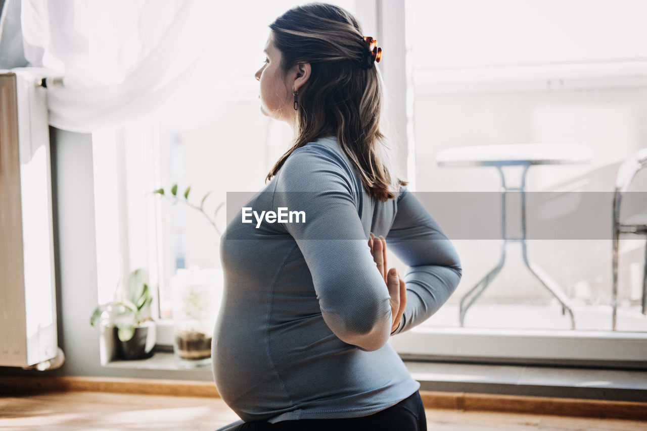 Benefits of prenatal yoga for pregnant women, including stress relief and improved flexibility