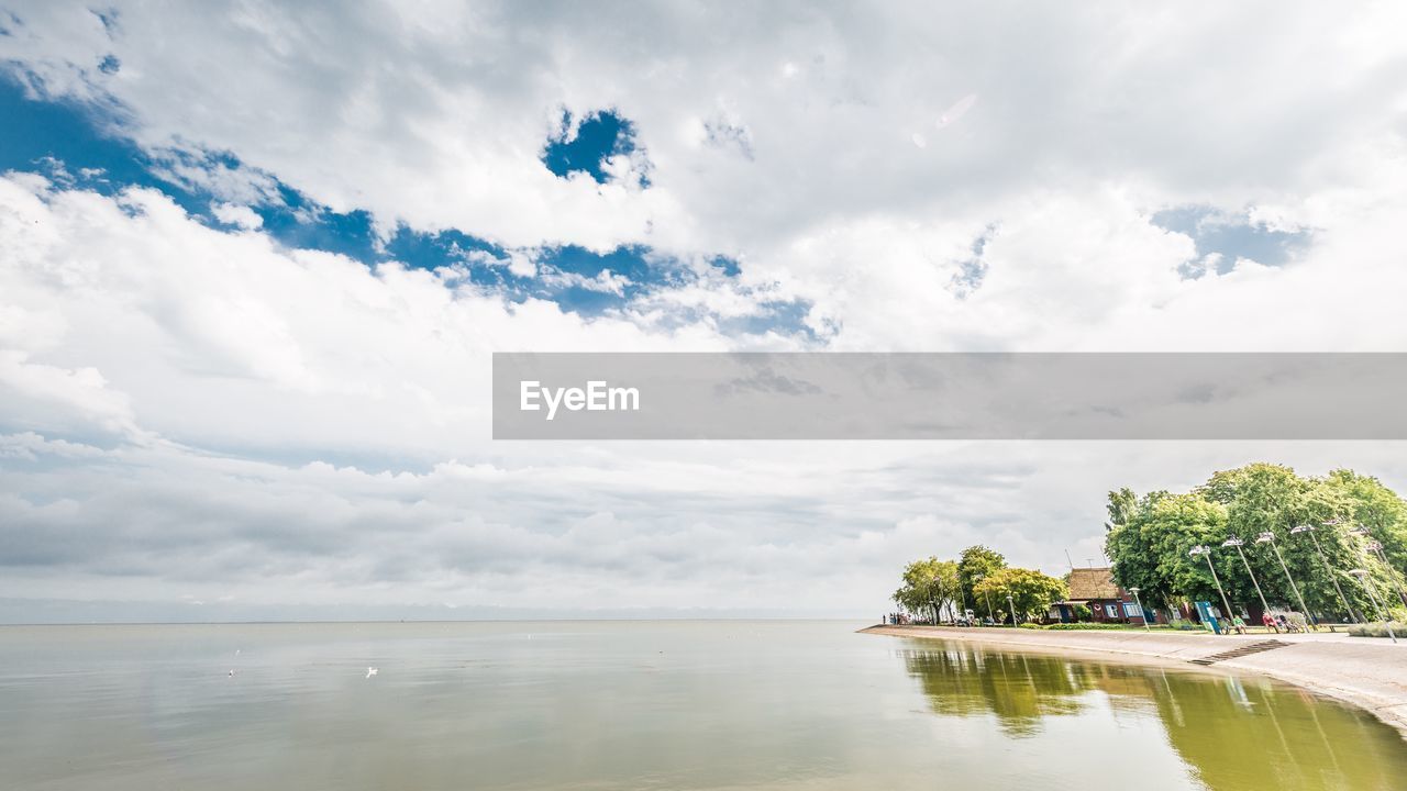 Scenic view of curonian lagoon against sky