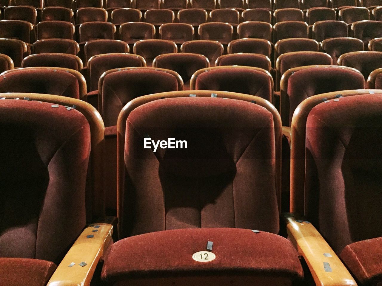 Full frame shot of empty seats at movie theatre