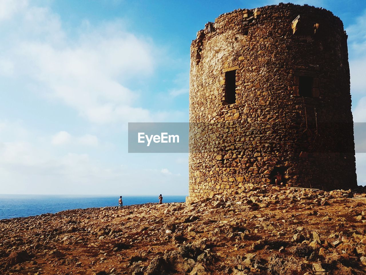 VIEW OF CASTLE AGAINST SEA