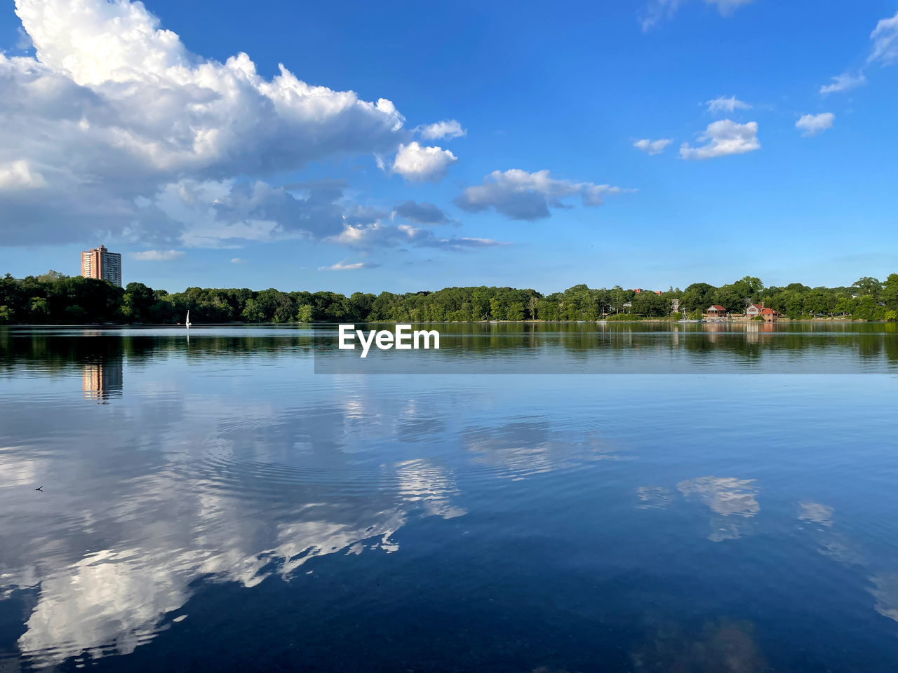 reflection, water, sky, cloud, nature, tree, environment, blue, architecture, lake, landscape, scenics - nature, travel destinations, beauty in nature, horizon, shore, plant, travel, tranquility, reservoir, body of water, built structure, dusk, morning, no people, building, outdoors, building exterior, land, tourism, tranquil scene, day, trip, city, vacation, summer, house, holiday, sunlight, idyllic