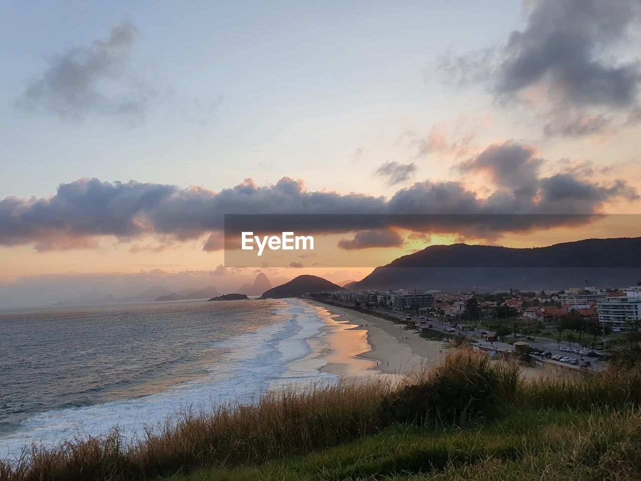 SCENIC VIEW OF SEA DURING SUNSET