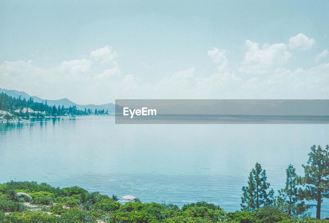 scenic view of lake by sea against sky