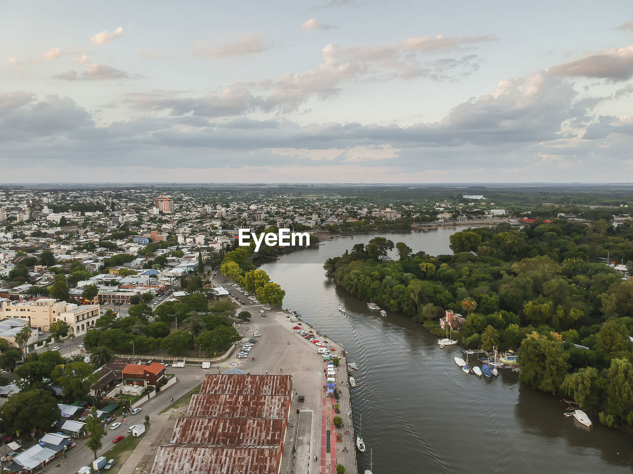 High angle view of river amidst buildings in city