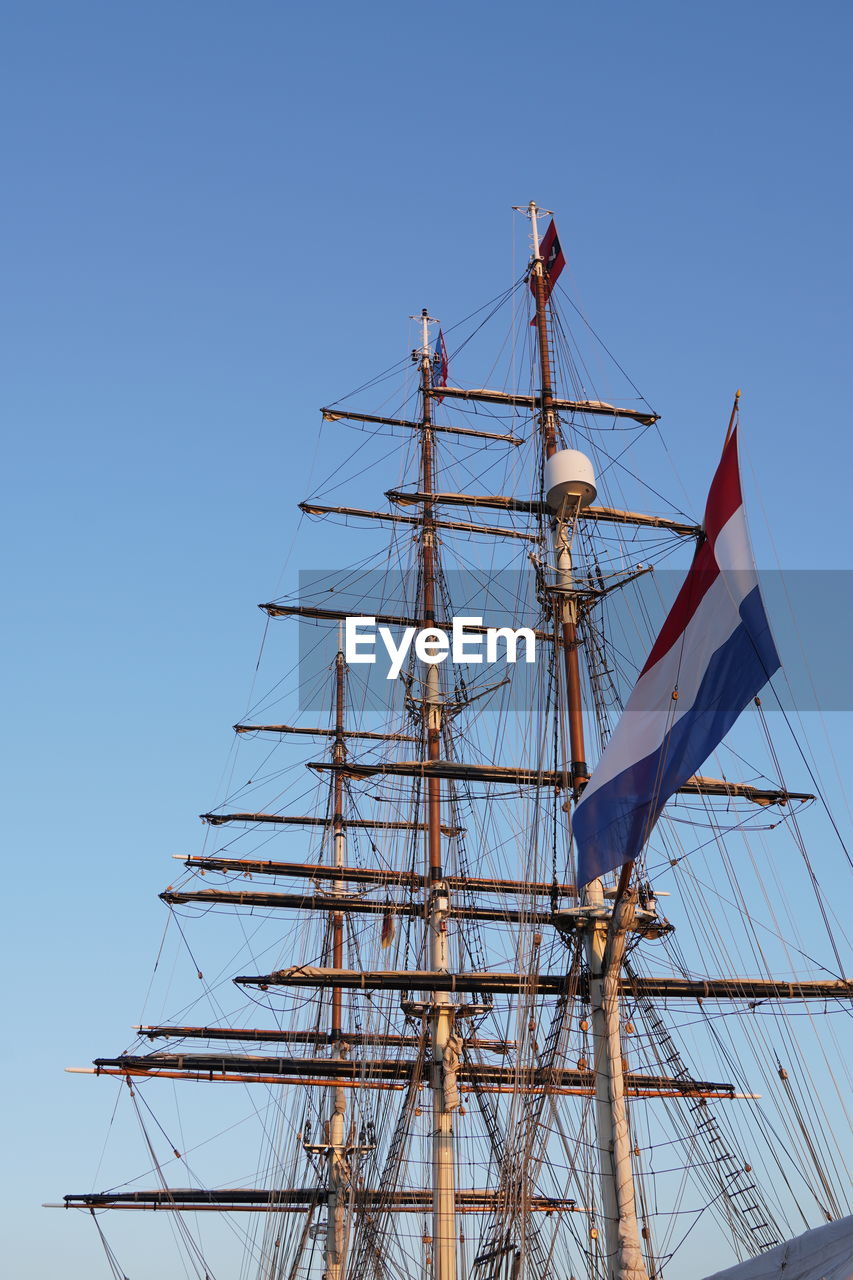 LOW ANGLE VIEW OF SAILBOAT AGAINST SKY