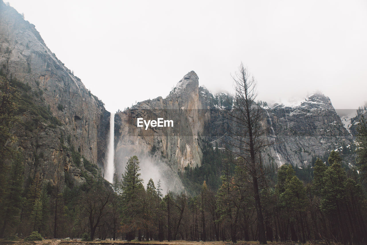 Panoramic view of mountains against clear sky