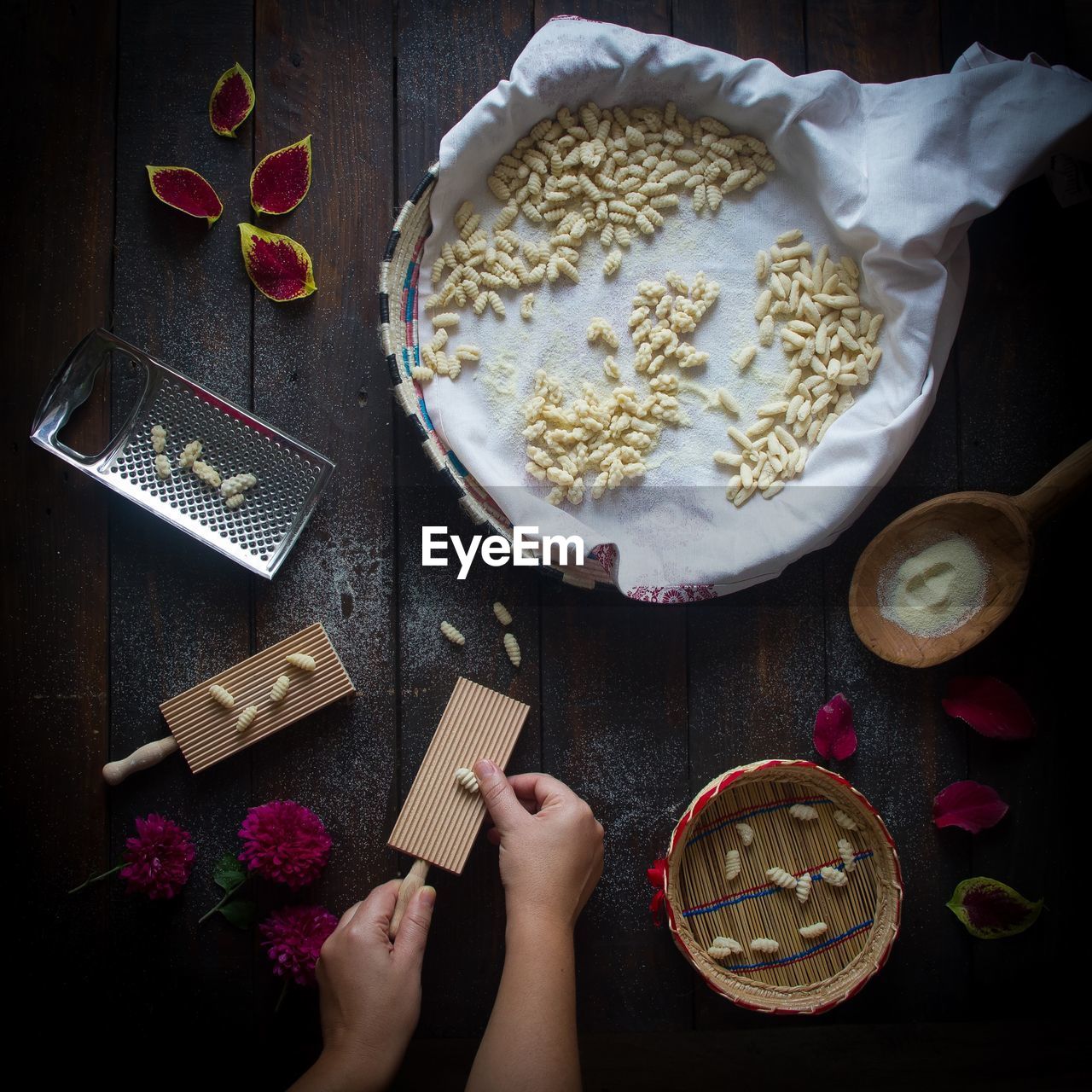 High angle view of woman preparing food on table