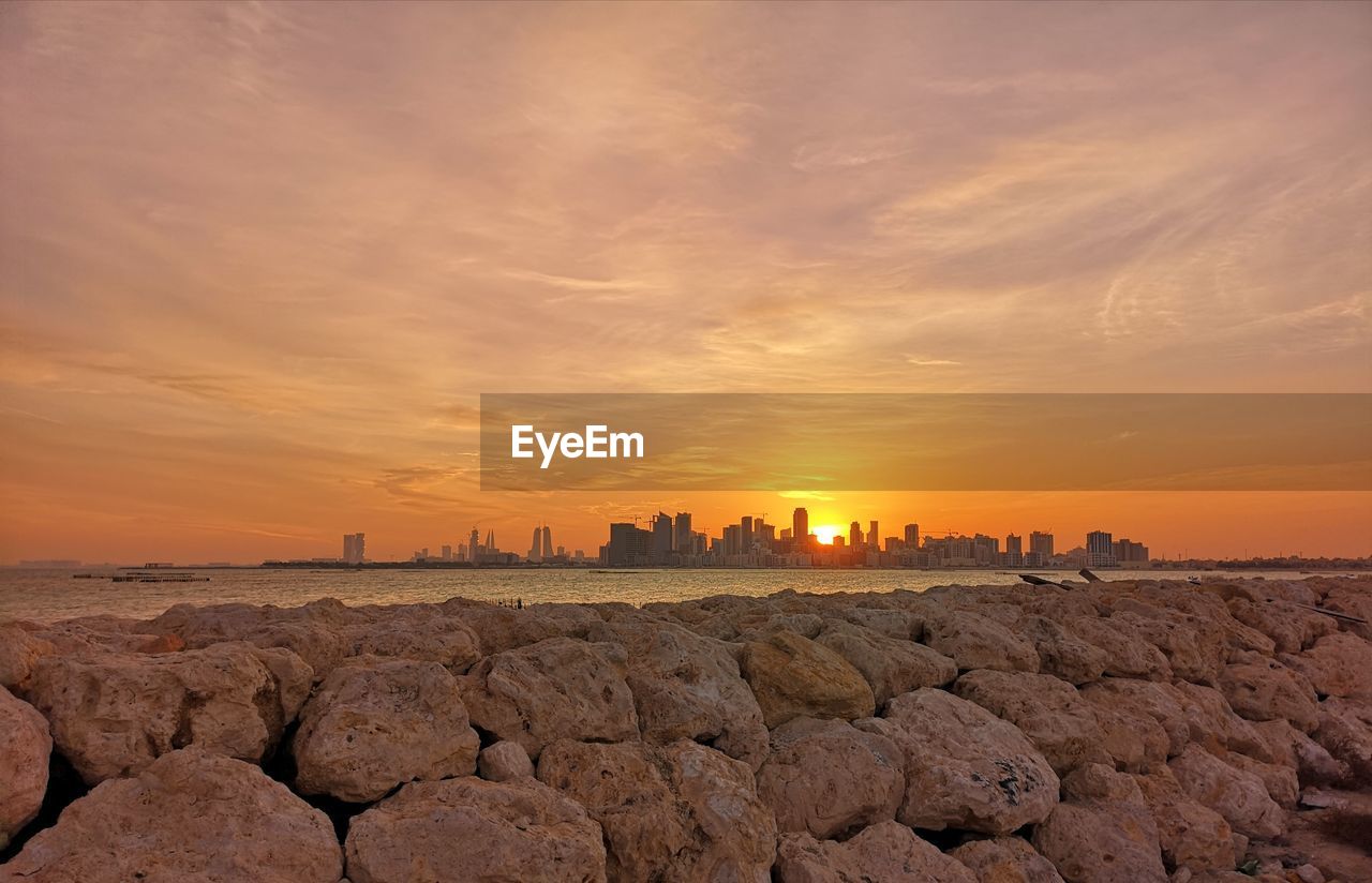 Scenic view of sea against sky during sunset