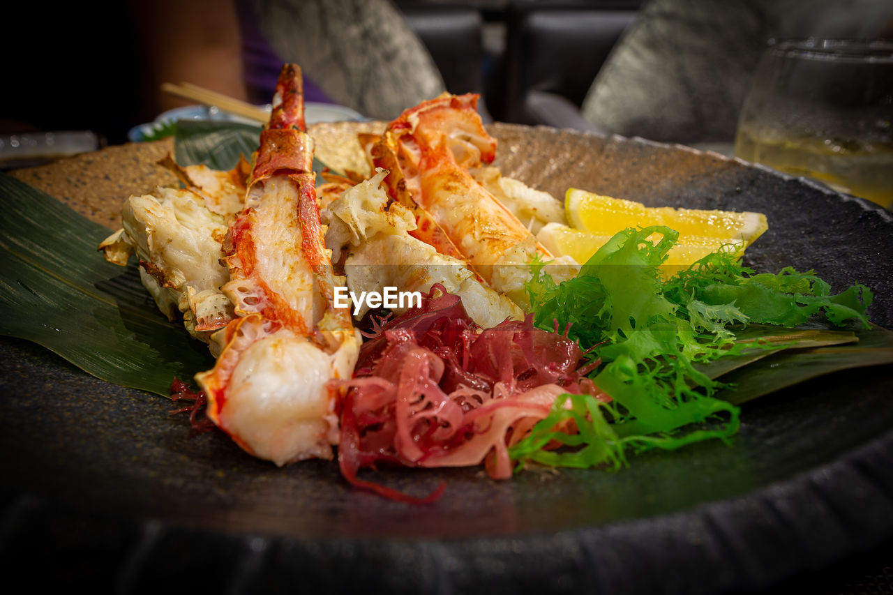 CLOSE-UP OF FOOD SERVED ON TABLE