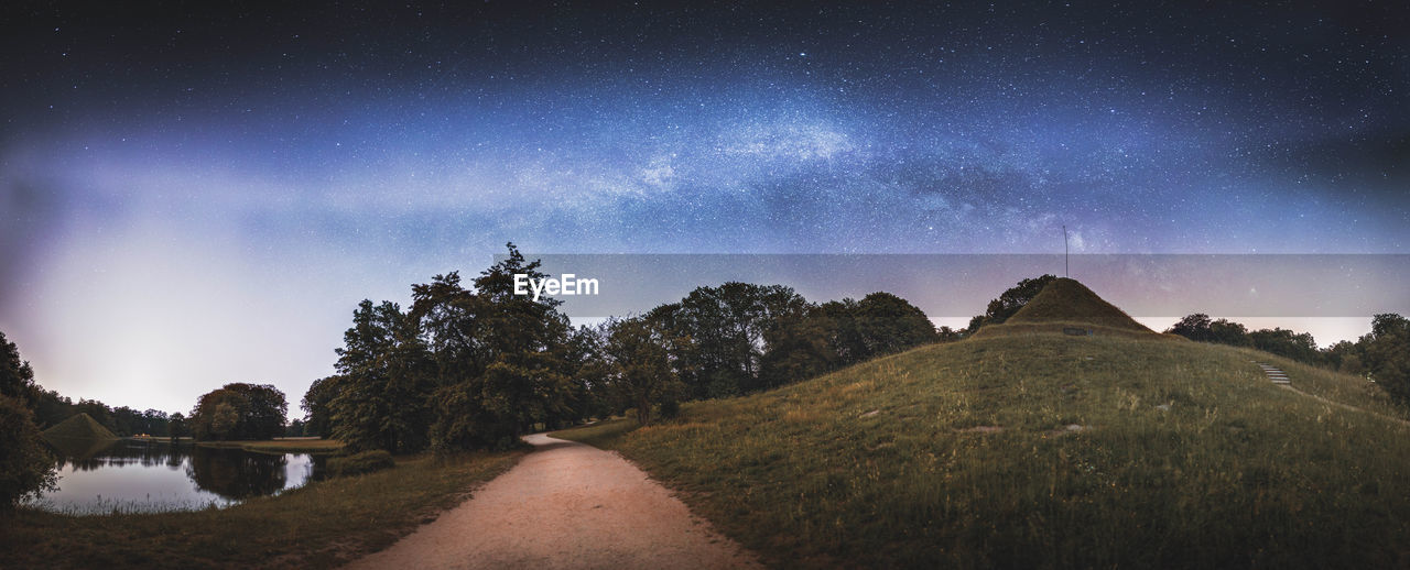 Milkyway Pano No. 2 Astronomy Astrophotography Landscape Nature Outdoors Travel Travel Destinations Pyramid Architecture Path Lake Reflection Milky Way Panorama Galaxy Star Star - Space Long Exposure Park Leisure Activity Freedom Free Free Time Tree Forest Grass Hiking Hill Pathway Path In Nature vanishing point Leading Leading Lines Cottbus Branitzer Park Dark darkness and light Dusk Dawn Wanderlust Exterior Exploring Mountain Man Made Object The Great Outdoors - 2019 EyeEm Awards