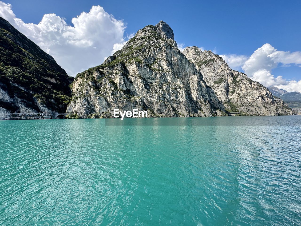 water, mountain, scenics - nature, beauty in nature, sky, land, environment, landscape, nature, mountain range, sea, blue, travel destinations, tranquil scene, turquoise colored, travel, tranquility, rock, idyllic, cloud, no people, mountain peak, day, tourism, pinaceae, non-urban scene, pine tree, bay, outdoors, beach, coniferous tree, tree, vacation, summer, trip, glacial landform, holiday, pine woodland, sunny, snow, cliff, forest, cold temperature, sunlight, waterfront