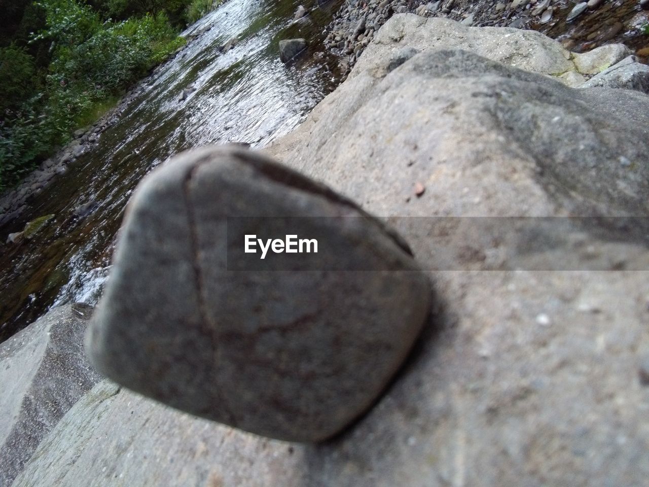 HIGH ANGLE VIEW OF STONES IN ROCK
